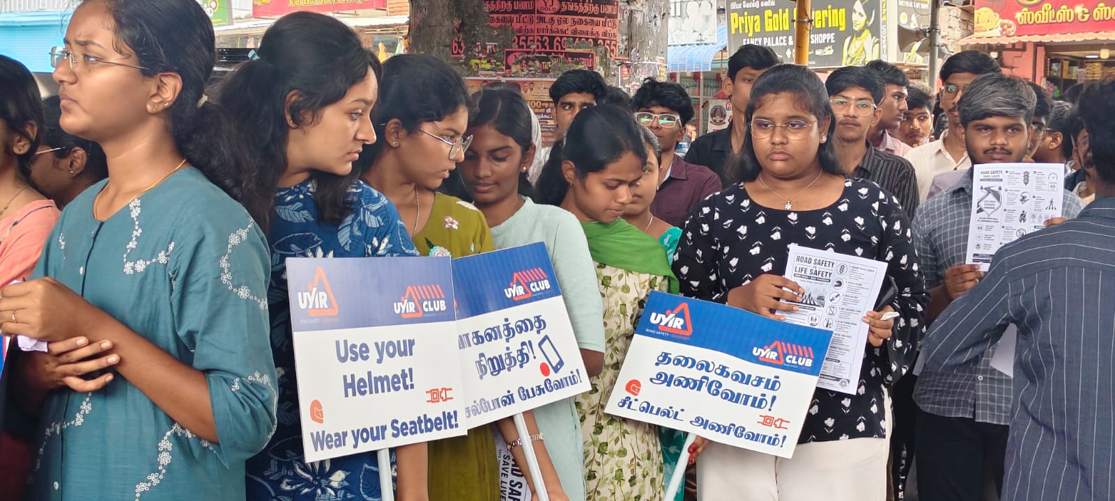 NSS volunteers at the road safety awareness rally in Karumathampatti